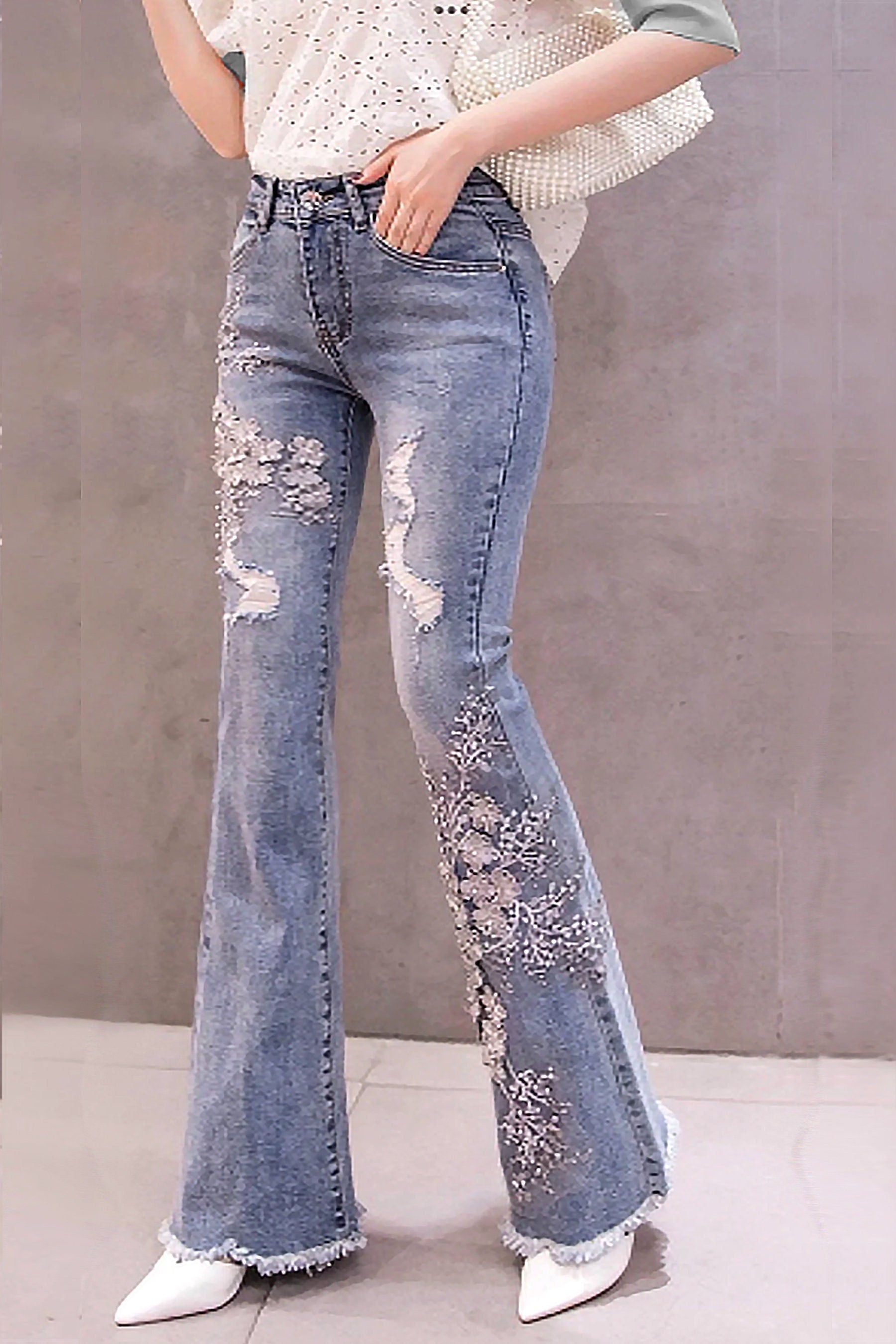 Ripped floral hot sale jeans