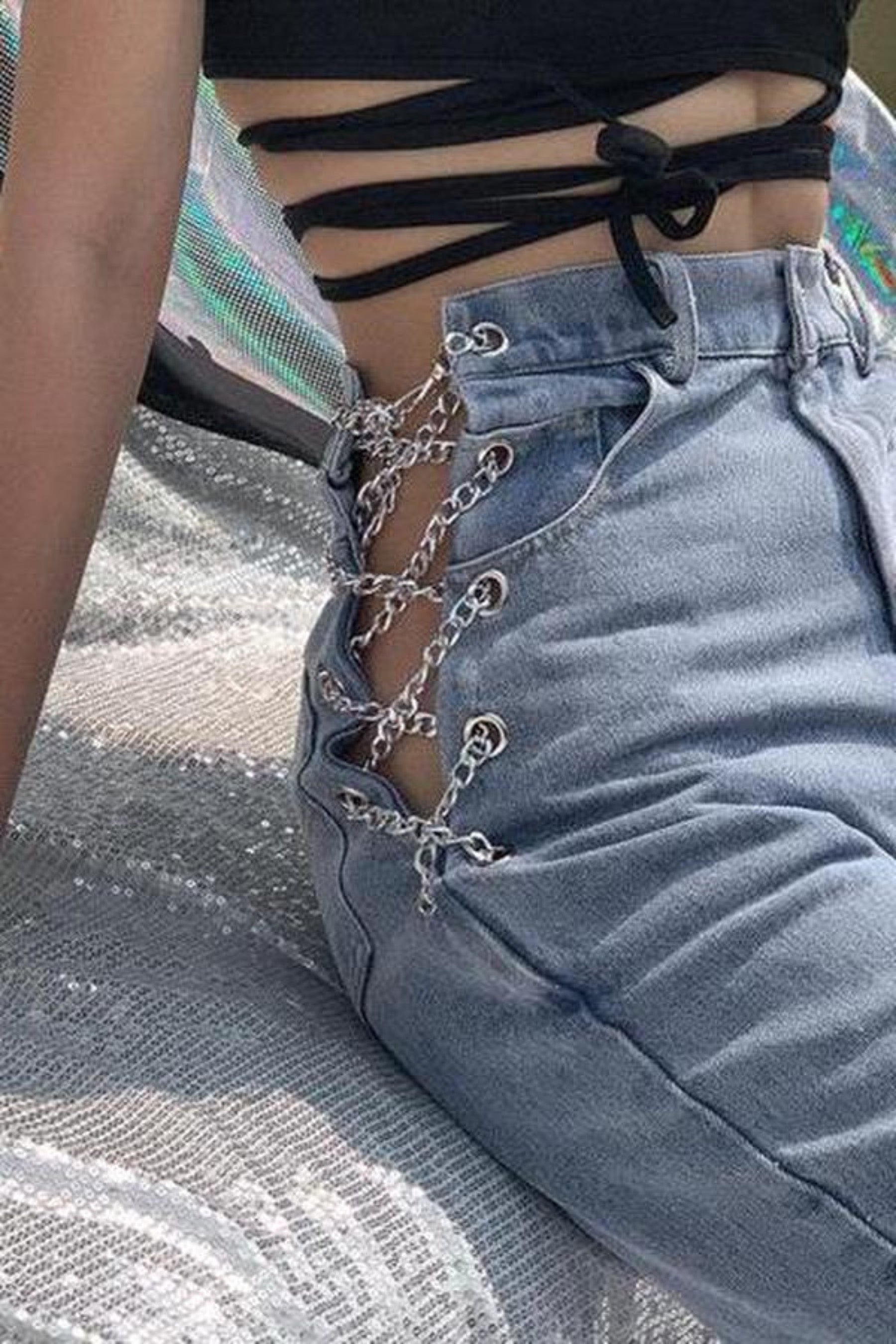 Cut up store jeans with chains